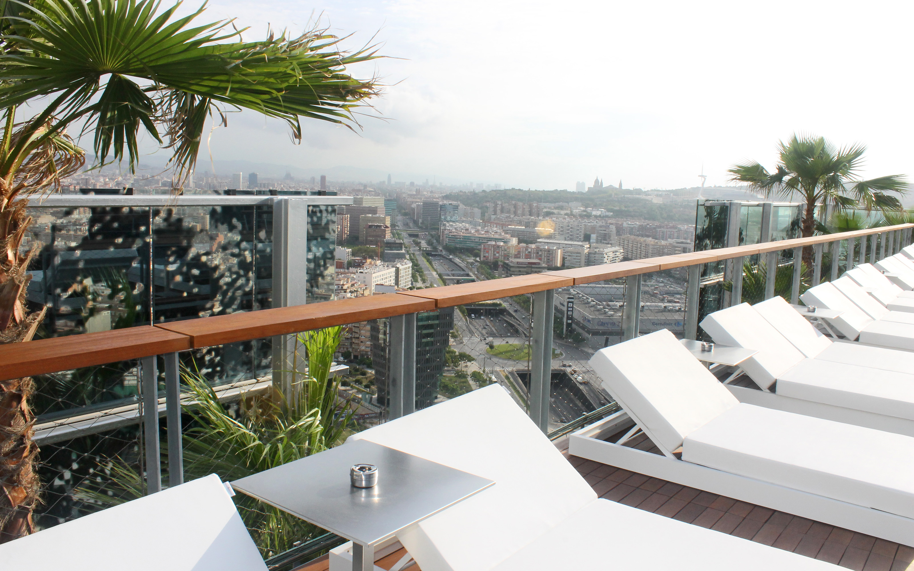 Roof garden with sun beds in a big city